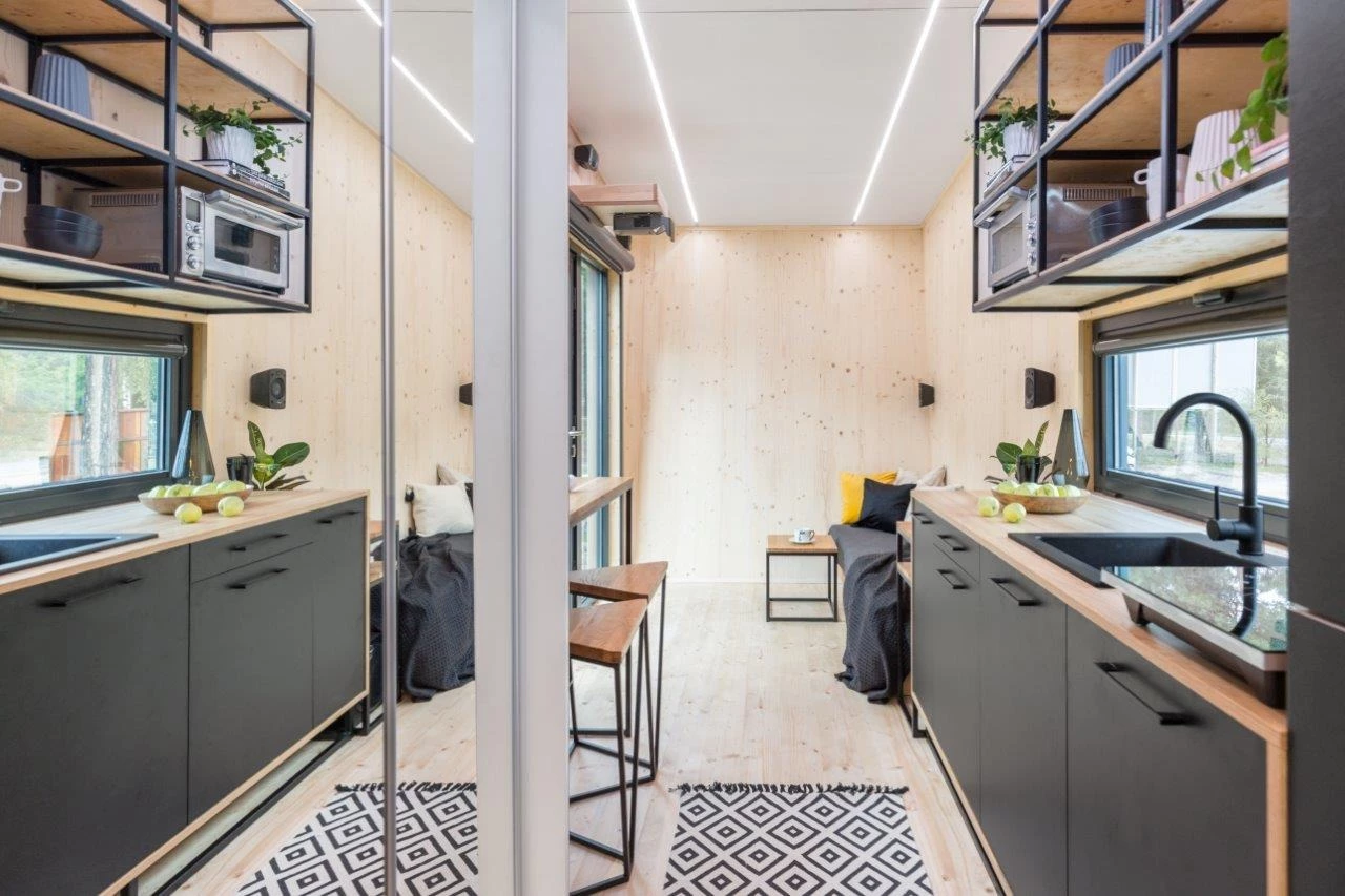 The Dark Vader's interior is finished in spruce and looks light-filled thanks to its generous glazing