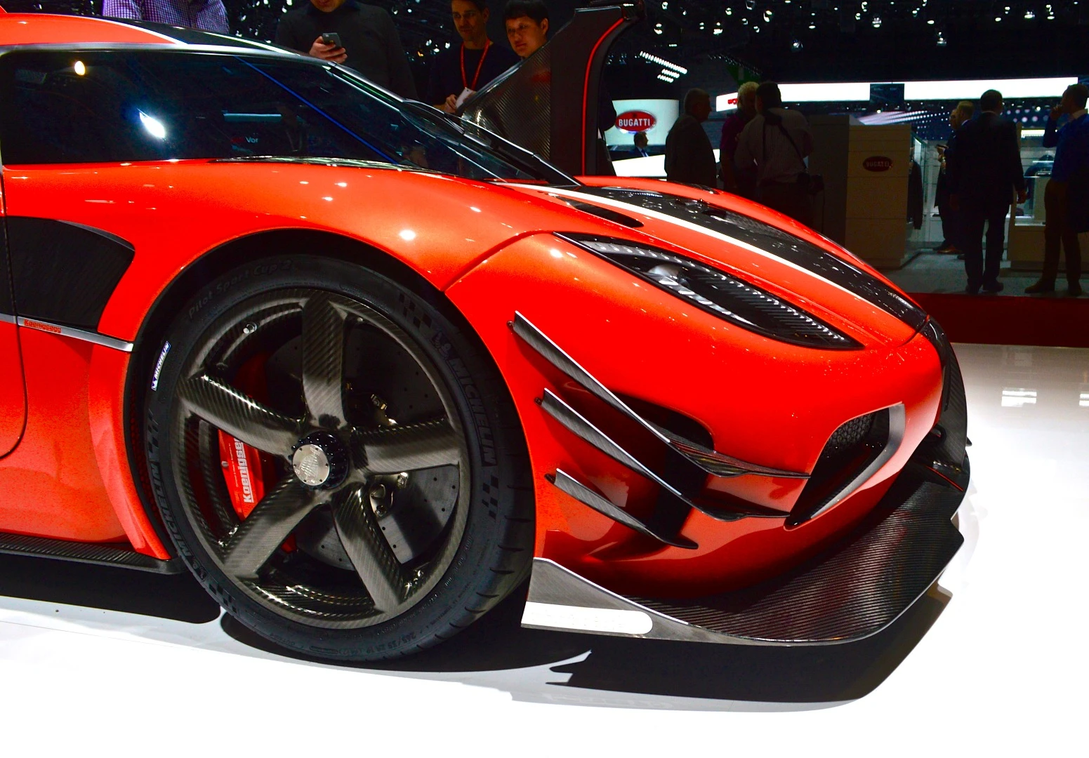 Aerodynamic features include a custom front splitter and bumper winglets