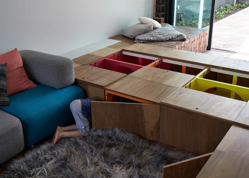 The storage space in the raised floor