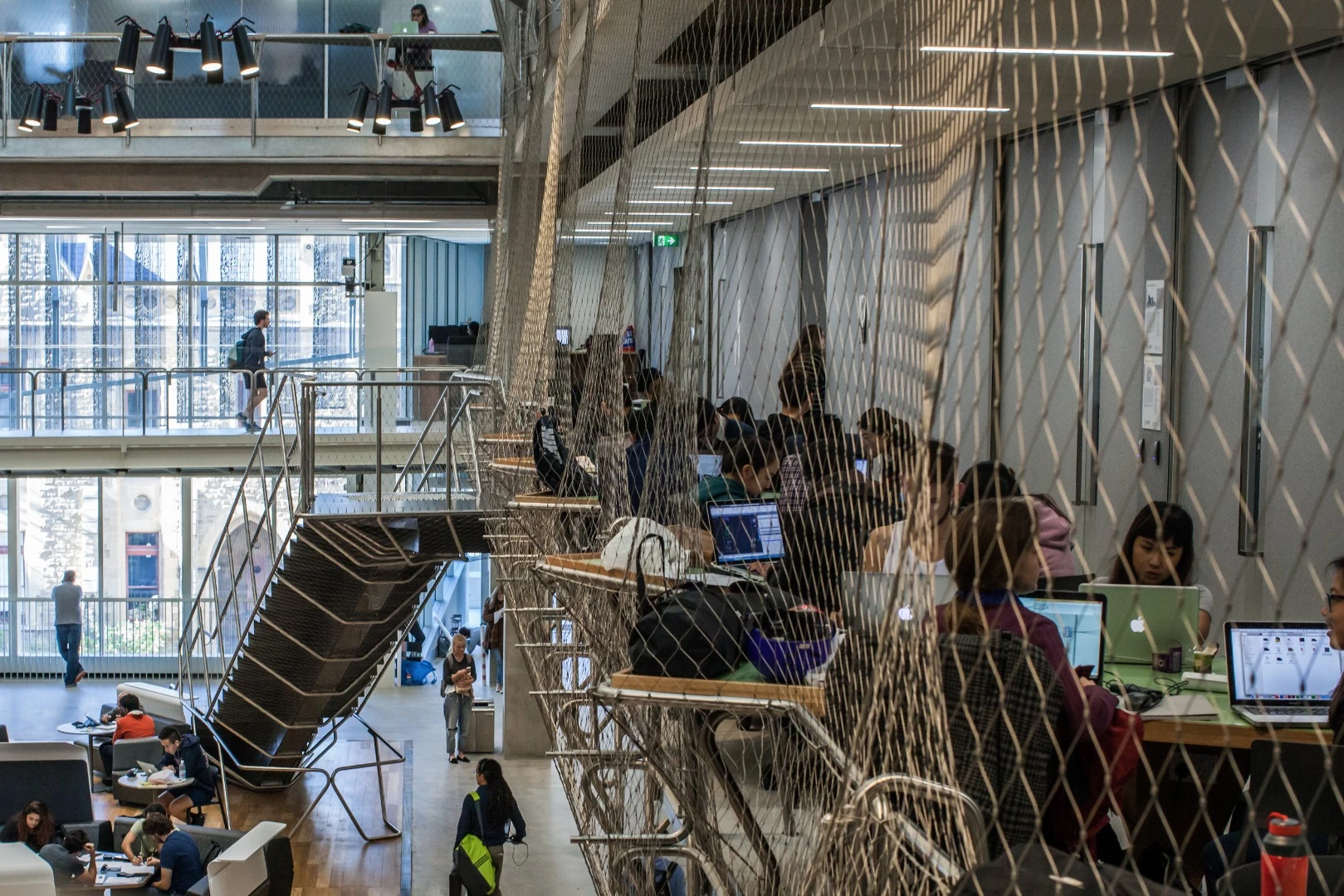 Up one level is where the studios and teaching spaces begin, but rather than lonely corridors and closed stairwells, the floor opens up to a mammoth four-story atrium bathed in natural light