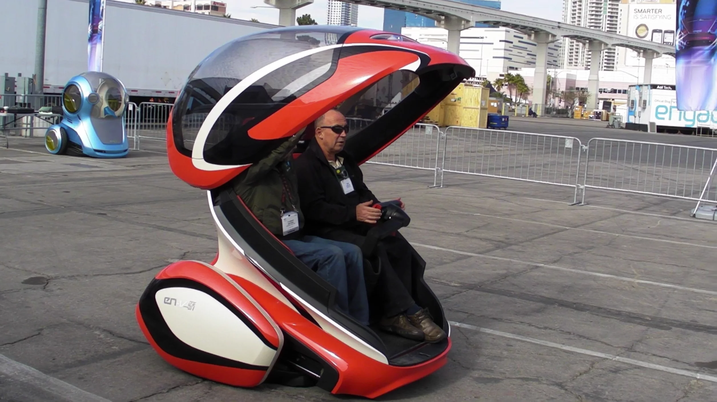 Author Mike Hanlon trying out General Motors EN-V self-balancing two-wheeled car (Photo: Ben Coxworth / Gizmag.com)