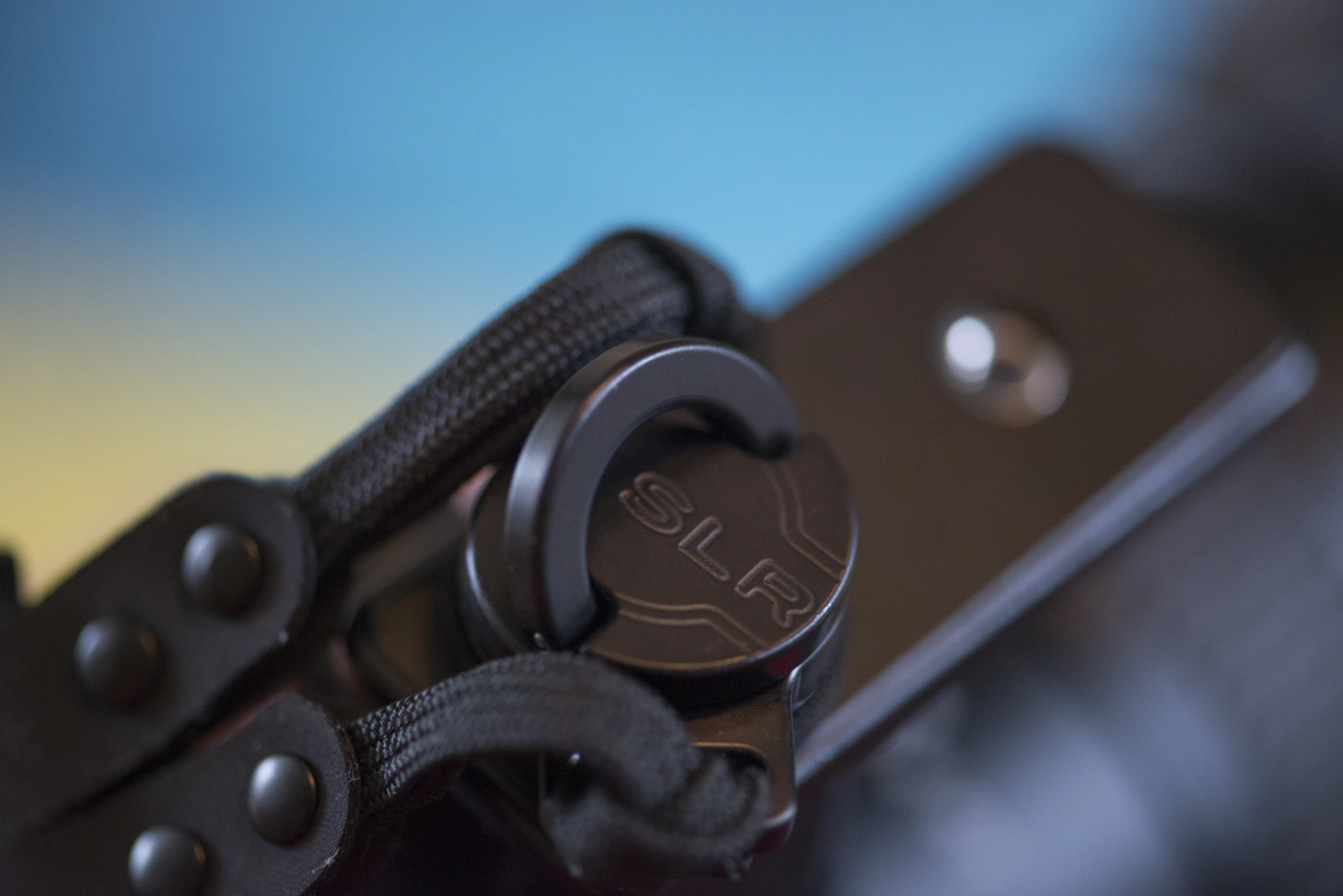 The Custom SLR Dual Camera Strap attaches to your camera or lens using a C-Loop Mount which screws into the tripod socket