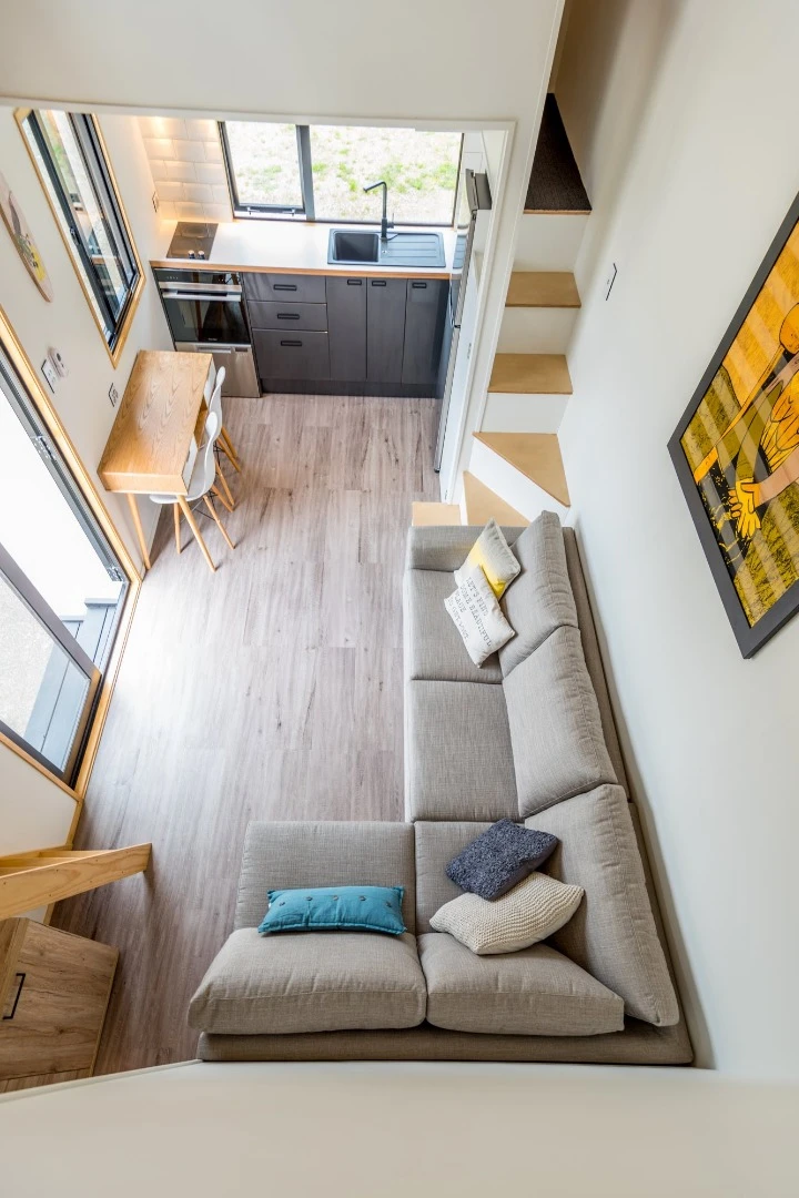 The Pohutukawa home boasts an overall interior space of 33 sqm (355 sq ft), including the two mezzanine lofts