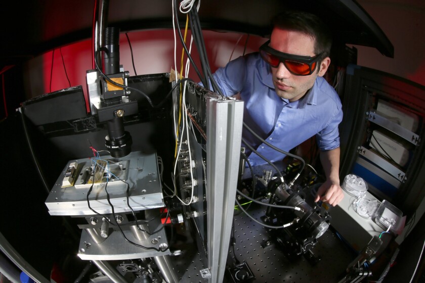 One of Prof. Kis' assistants working with the prototype sensor