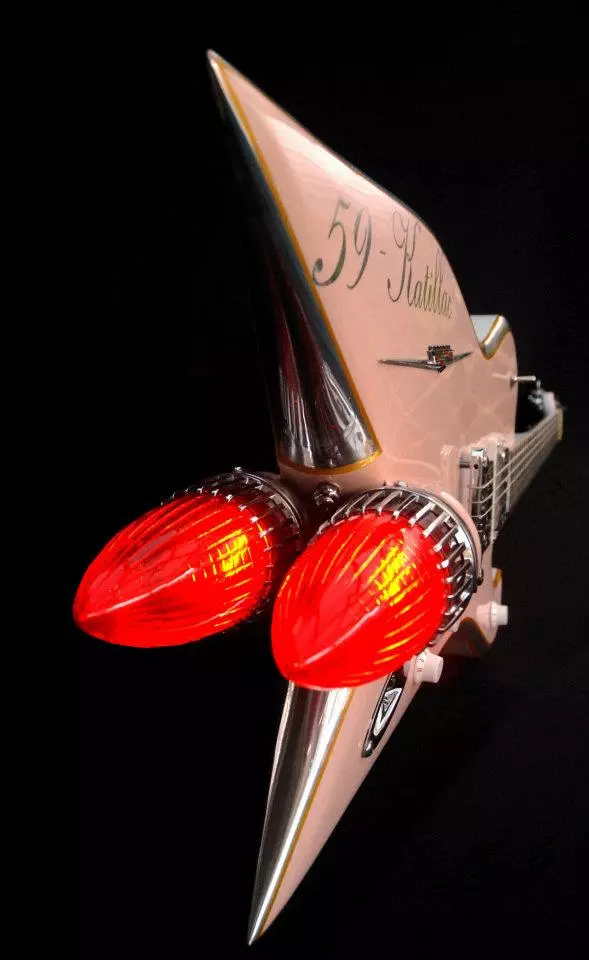 The 59 Katillac includes original 1960 Cadillac tail light housing, a Caddy emblem on the front of the body and shark airbrush work on the rear