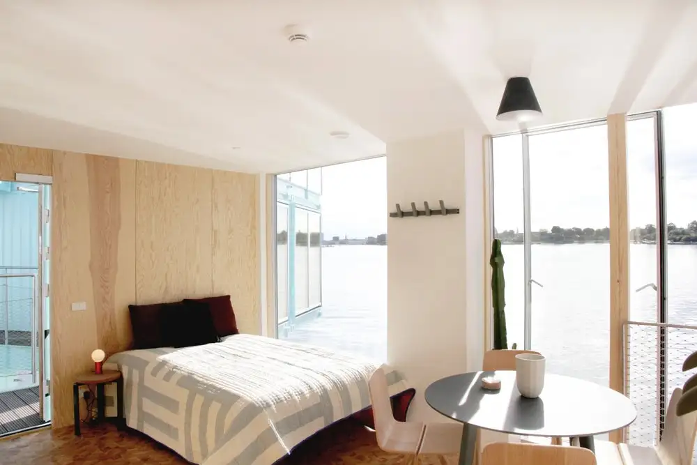 The Copenhagen Urban Rigger project comprises nine recycled shipping containers arranged on a floating base in the city's harbor