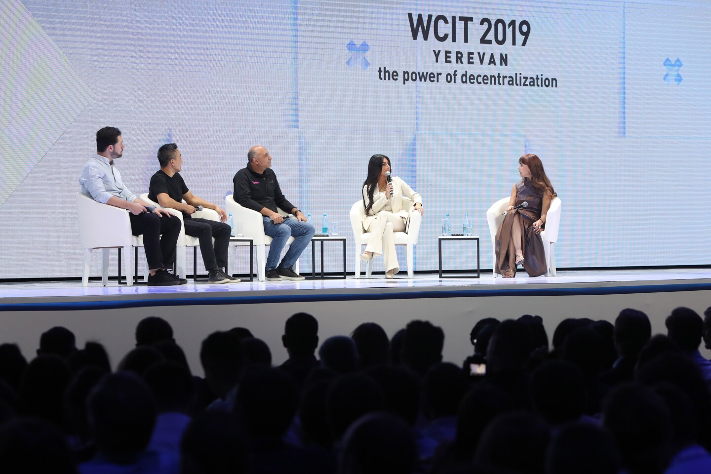 The "Marketplace of Ideas" panel at WCIT Yerevan 2019. Left to right: Reddit co-founder Alexis Ohanian, GIPHY co-founder Alex Chung, Picsart founder Hovhannes Avoyan, celebrity famous person Kim Kardashian, and moderator Magdalena Yesil