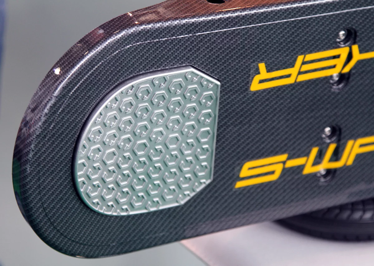 The grip pads form a contact to activate the motor when a rider puts their weight on them