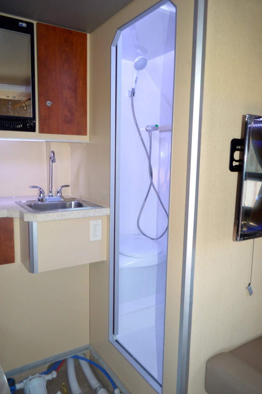 The kitchen area and bathroom are located at the back of the ADAK Trailer (Photo: C.C. Weiss/Gizmag)