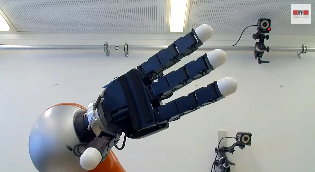 The robotic arm is capable of calculating the path of moving objects, moving to intercept them at staggering speed