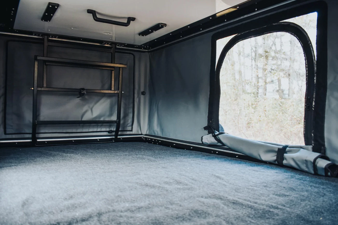 The pop-up roof tent can sleep two people, and you can climb in using an external foldable ladder