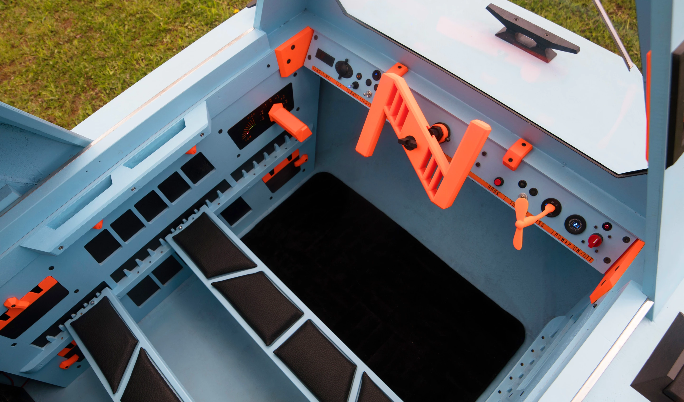 The Z-Triton features a small cockpit area for piloting it on the water