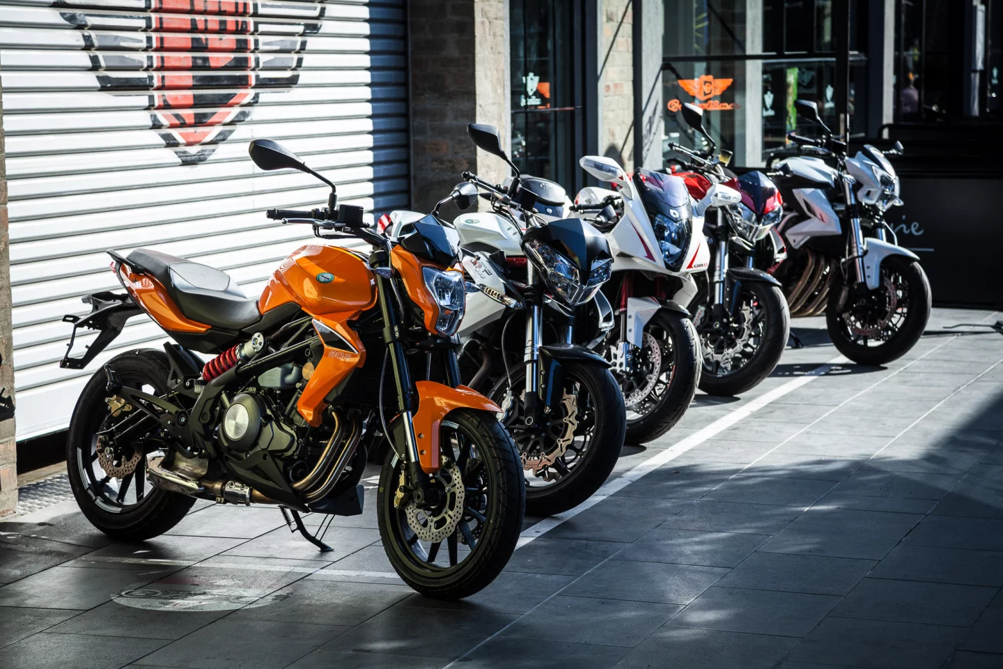 The Benelli BN302 in front of a murderer's row of stablemates, including the TnT 1130 (Photo: Loz Blain)