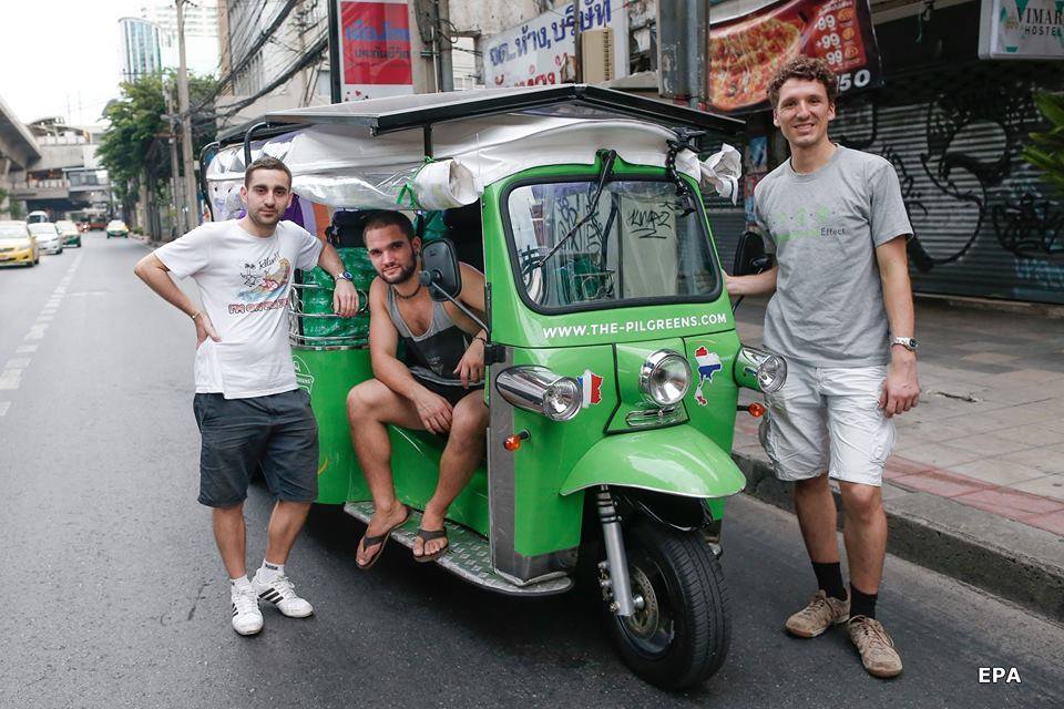 Karen, Remy and Ludwig, from left to right, pose with their adventure-ready tuk-tuk