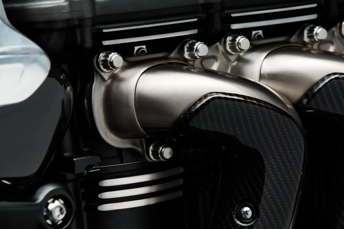 You thought we were finished with the exhaust headers, didn't you? Wrong