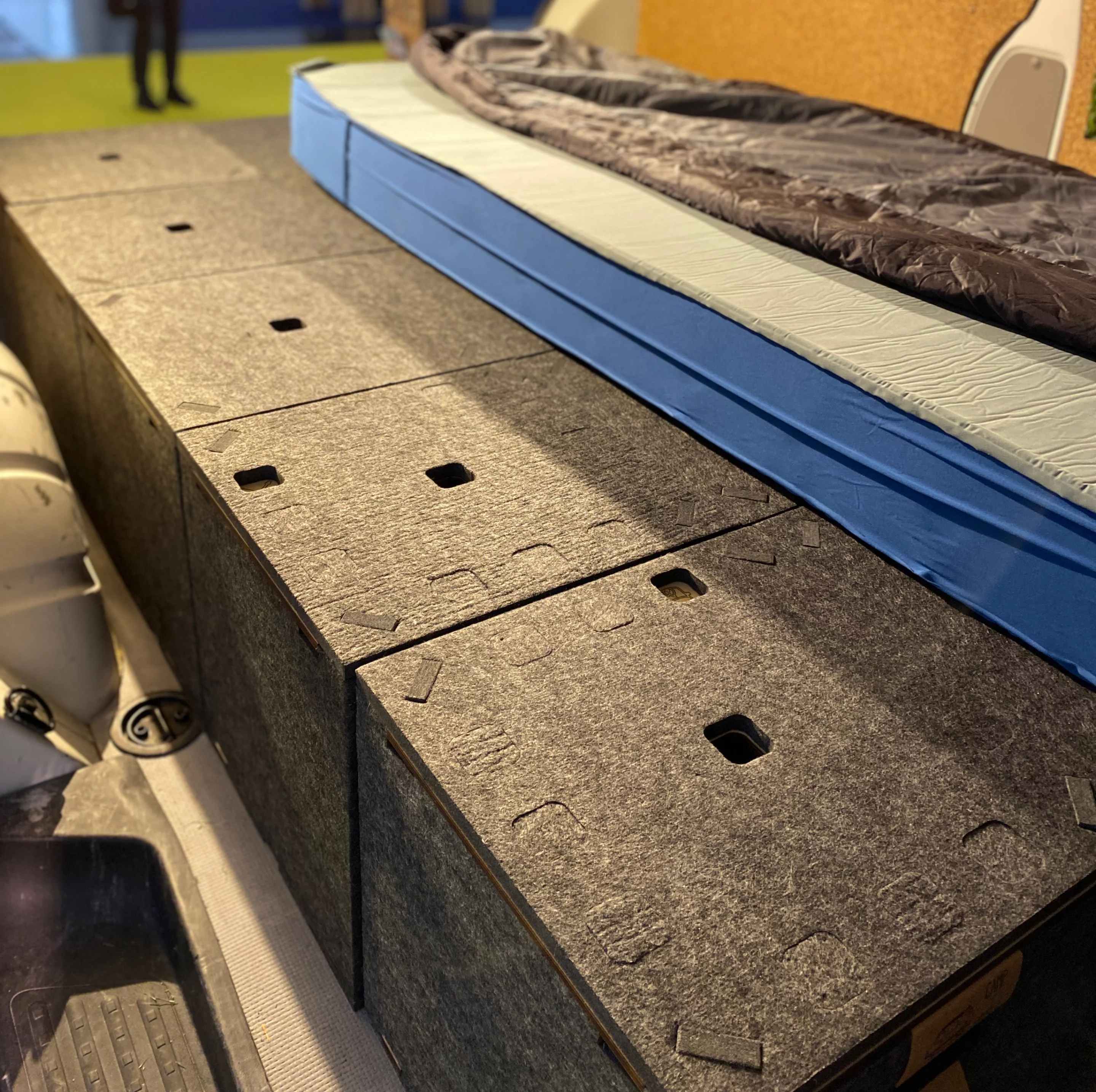 Camp it Simple is less a complete camper van solution, more an easy, organized way of creating a sleeping surface with rugged storage boxes