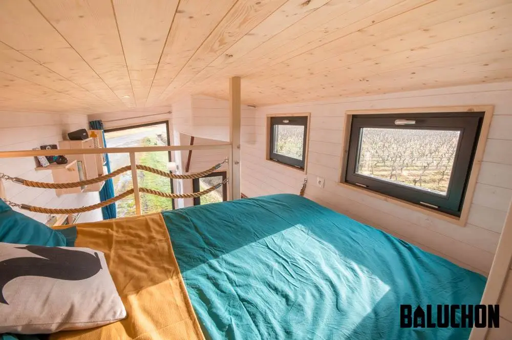 The Utopia's bedroom includes a closet and a double bed