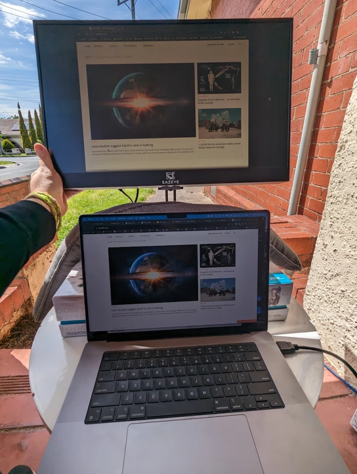 Using the Eazeye outdoors on a sunny day certainly makes it bright – but you'll need to pick your spots to make sure the background is brighter. And watch out for wind! (Macbook at ~30% brightness)