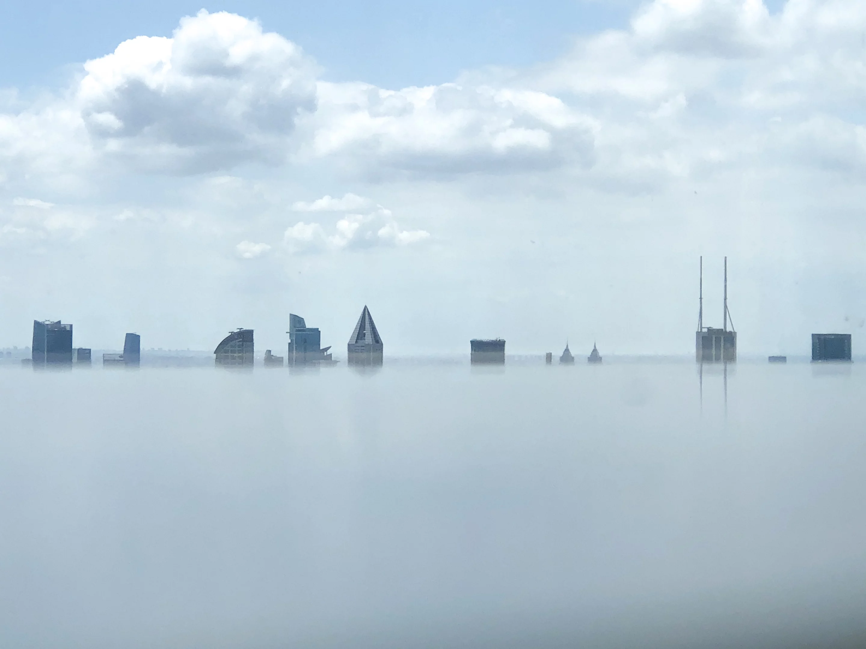 Books over the clouds is situated near the middle point of the Shanghai Tower, on the 52nd floor, at a height of 239 m (784 ft)