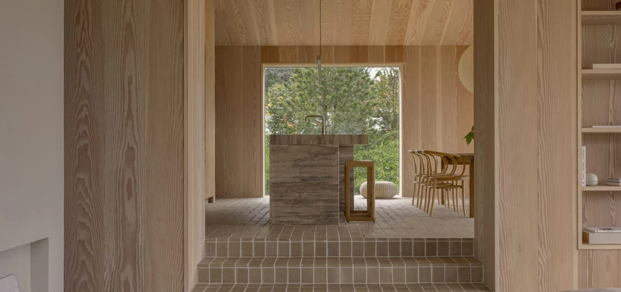 The Heatherhill Beach House by Norm Architects seamlessly integrates with its scenic surroundings