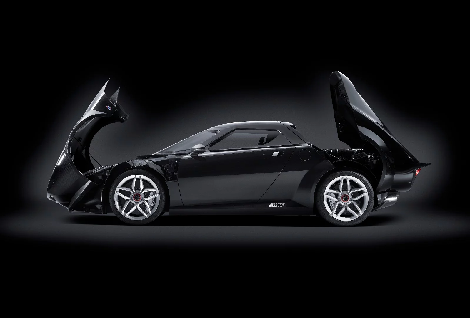 The original Stratos had removable hatches front and rear to help ease servicing during grueling rally stages