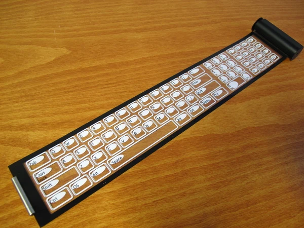 The Qii is a thin, flexible keyboard that connects wirelessly to smart devices and rolls up into a portable case about the size of a roll of coins