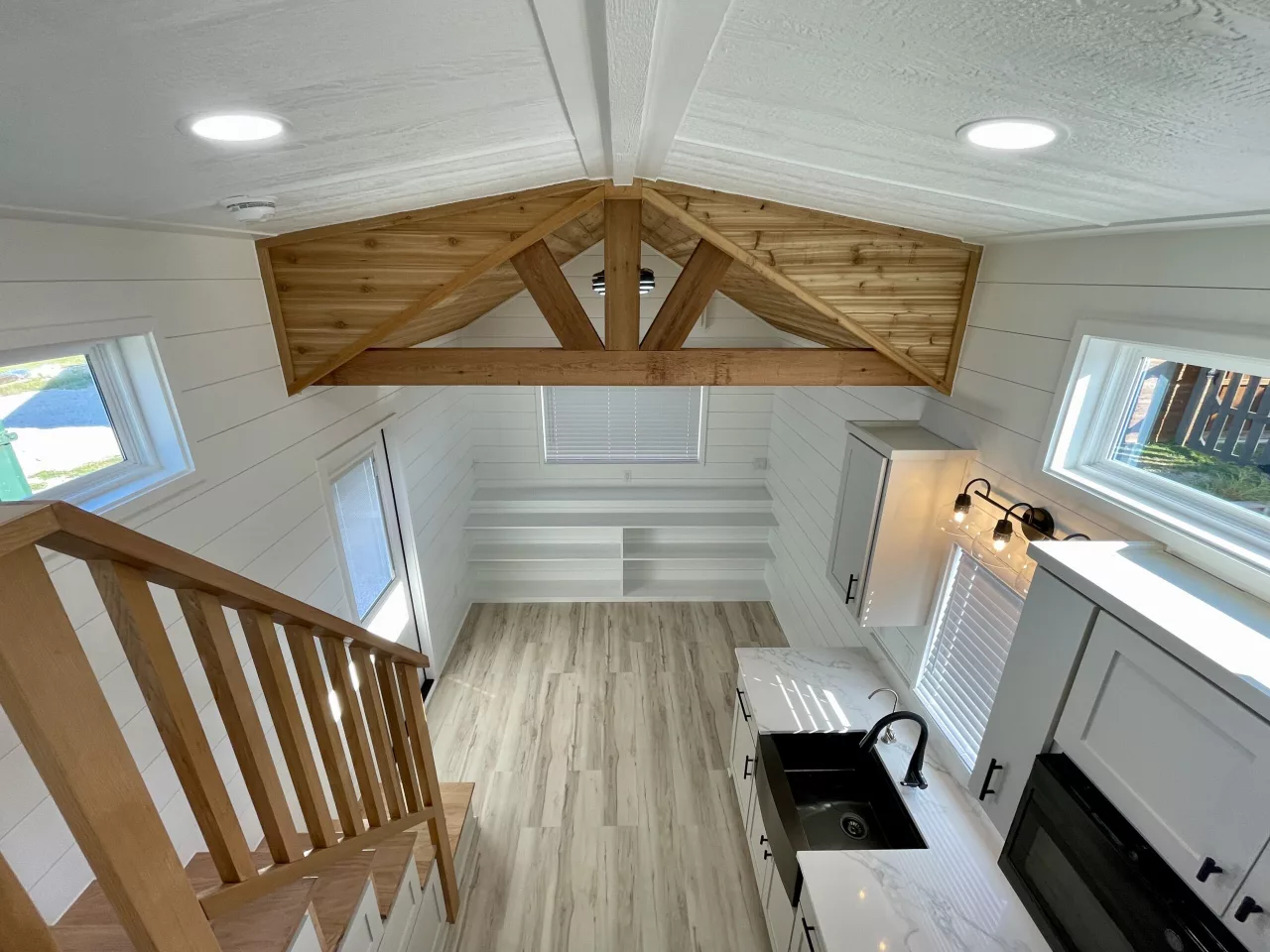 The New Chapter's spacious living area is enlivened by a decorative wooden ceiling