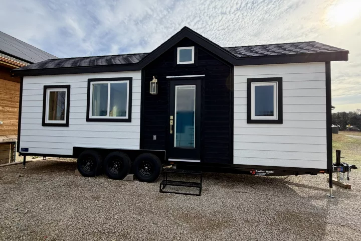The Betty tiny house is a compact towable home for two that packs in lots of storage and a well-designed interior