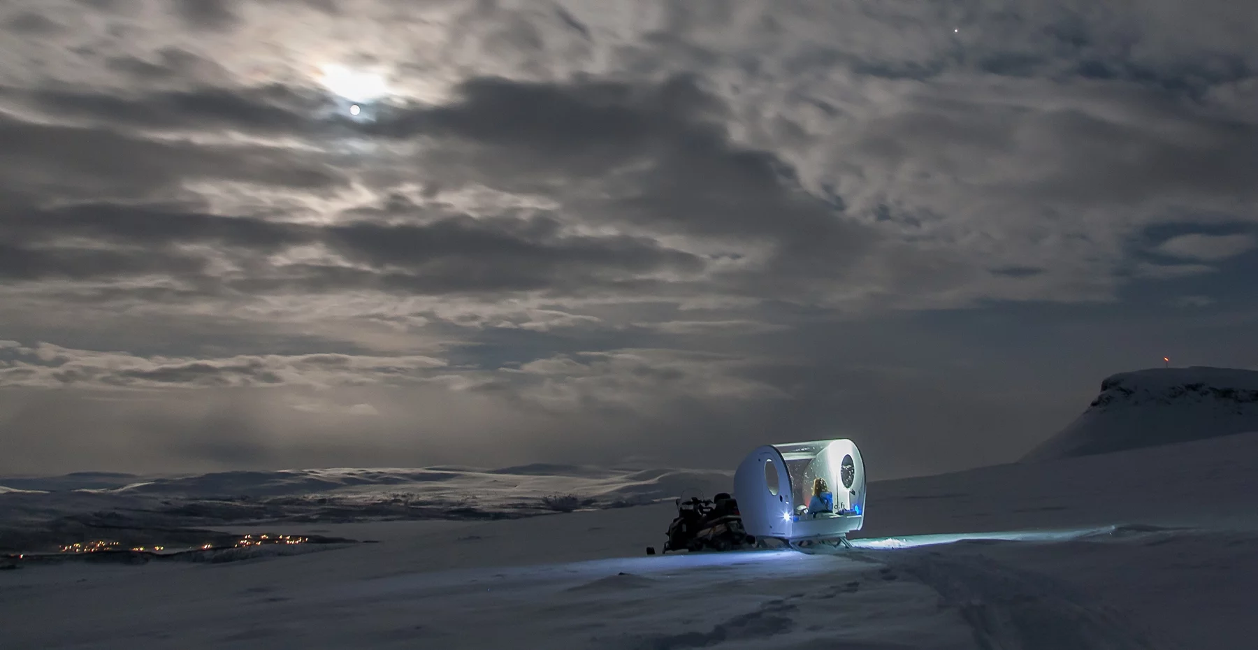 The Aurora Bubble Sled give visitors the opportunity to view the Northern Lights in solitude and away from any light pollution, while also experiencing the wilderness of the Artic Tundra
