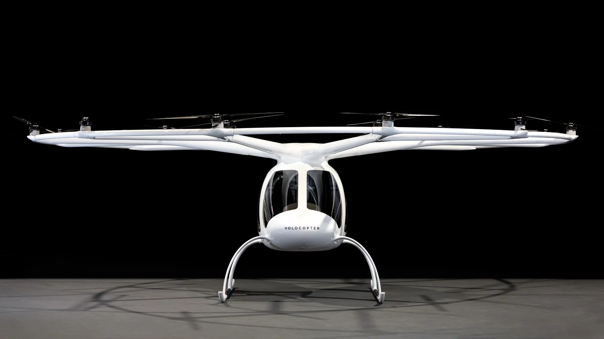 The Volocopter 2 is an all-electric aerial mobility machine that takes up to two passengers from point A to point B without a pilot