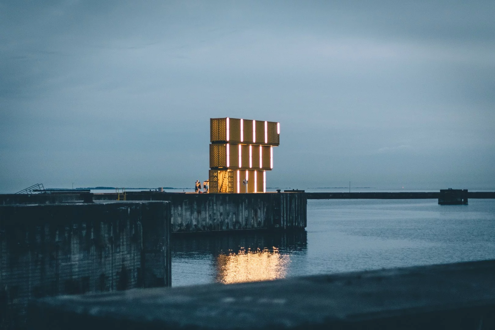 The Water Sports Center Halsskov's diving tower is made from three stacked shipping containers