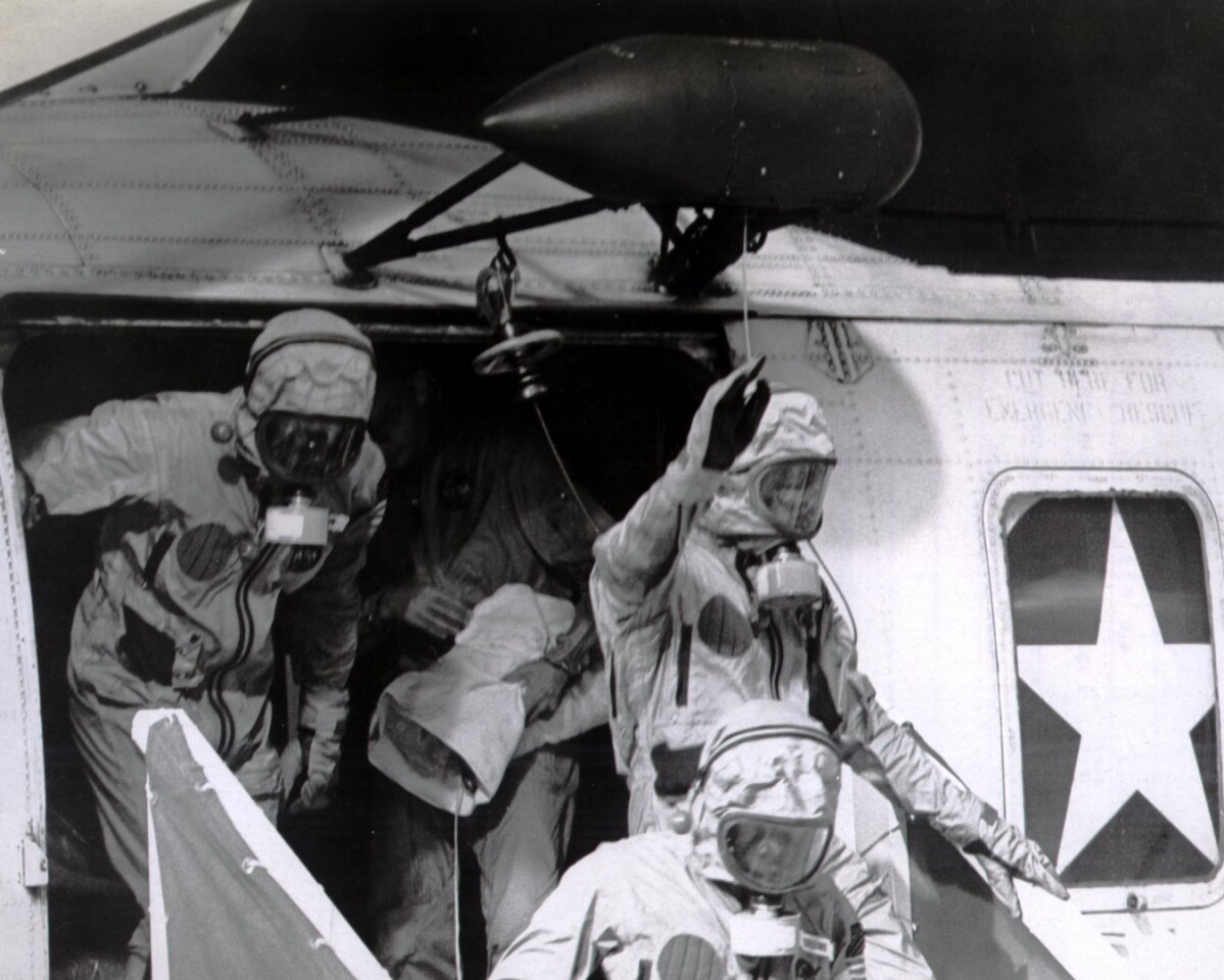 The Apollo 11 crew disembark on USS Hornet