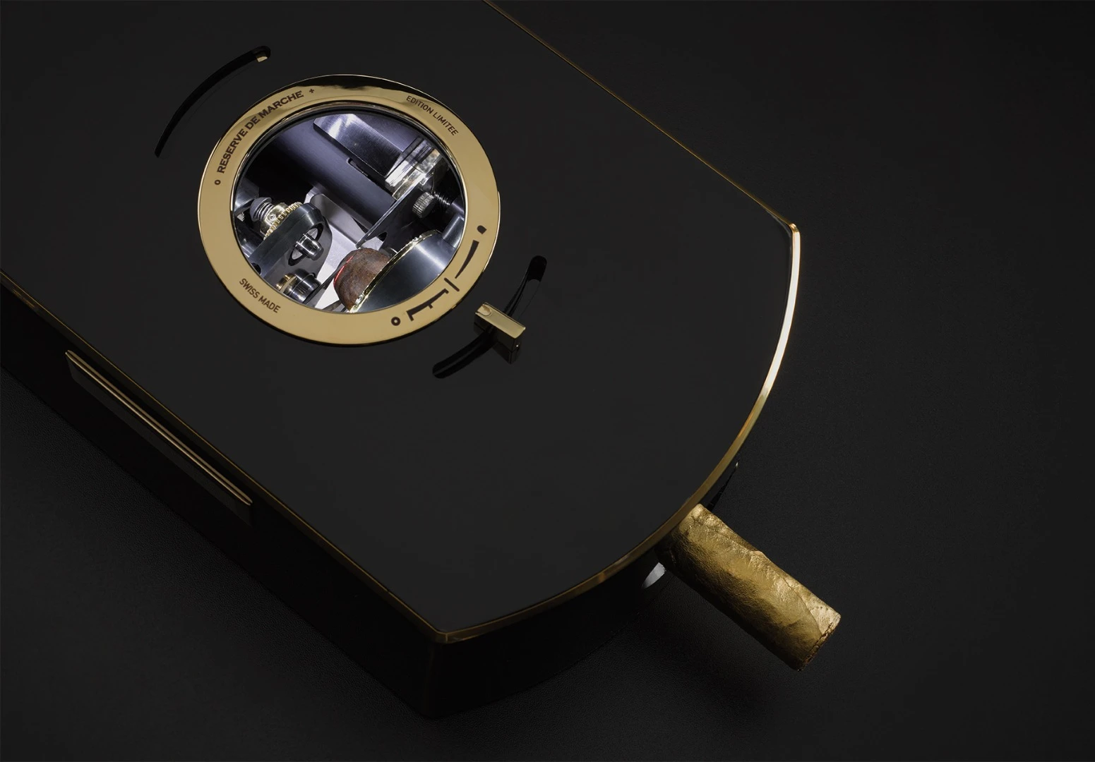 The Emperador's cigar cutter and snip or pierce