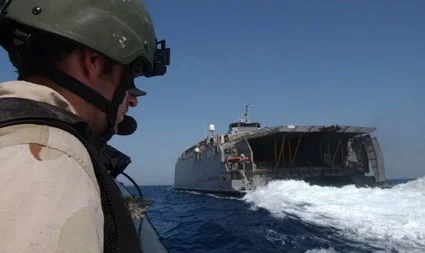 A special safetyobserver watches theHSV-X1 Joint Venture