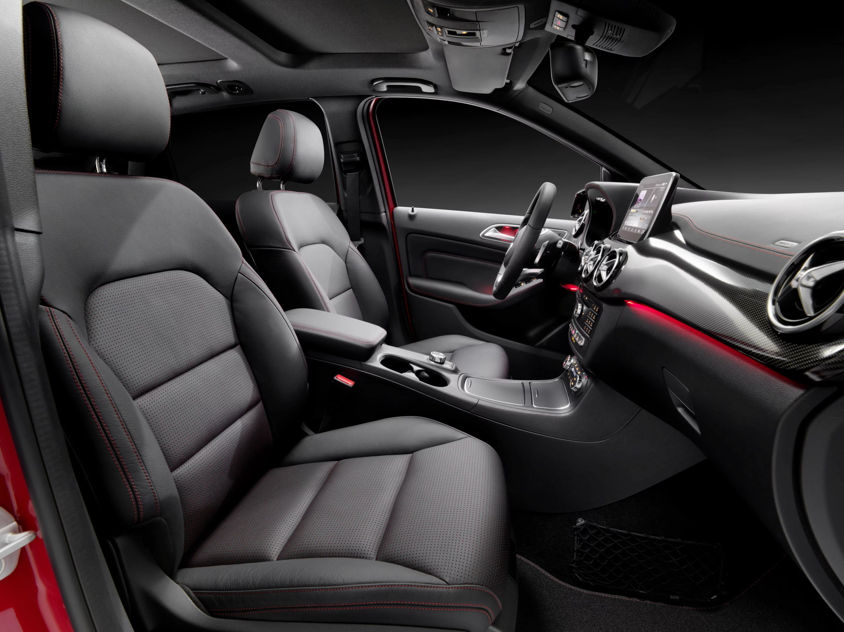 A larger, 8-inch COMAND screen sits atop the dash