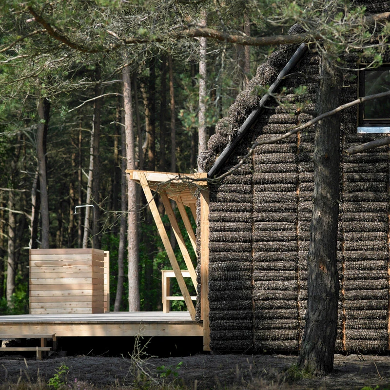 The Modern Seaweed House was constructed with timber-frame panels and stuffed with seaweed as an alternative to mineral wool