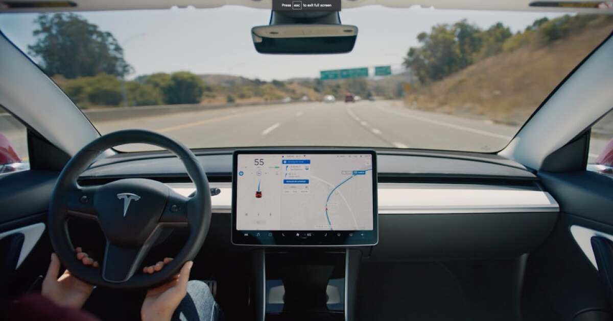 Tesla's latest Autopilot update lets the car change lanes on its own