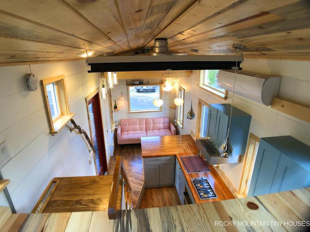 View of the Bradford 26' Tiny House's living/sleeping area from the bedroom