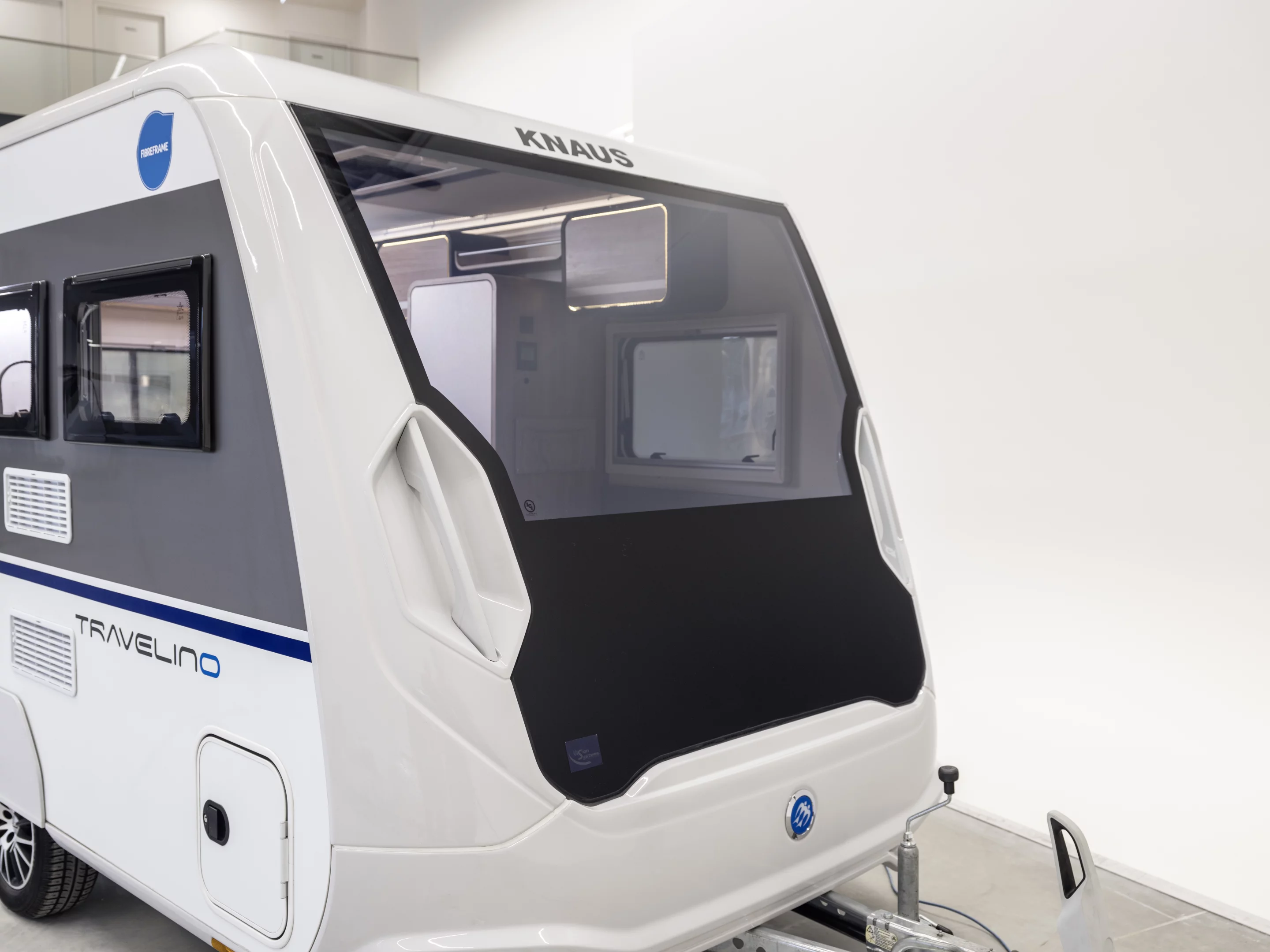 The large electrochromic glass window adds a new innovation to the Travelino trailer