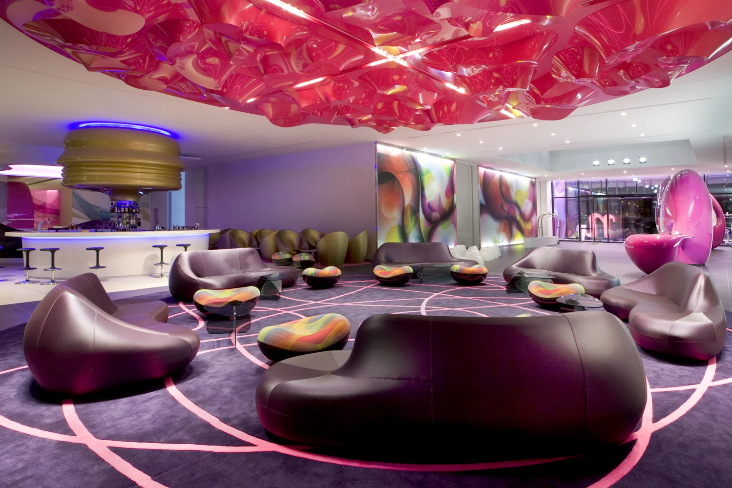 The nhow hotel's lounge in the entrance hall, next to the Envy bar past the reception desk(Image by nhow Berlin)