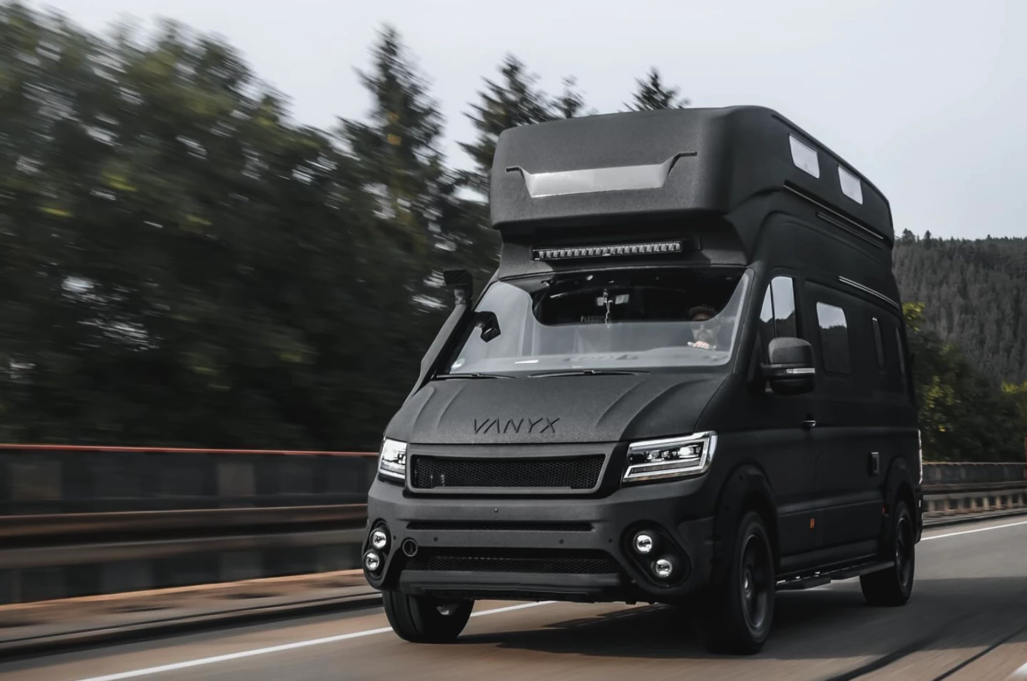 The Vanyx seems quite at home on the highway ... but good luck to the driver behind it trying to see over and beyond the roof