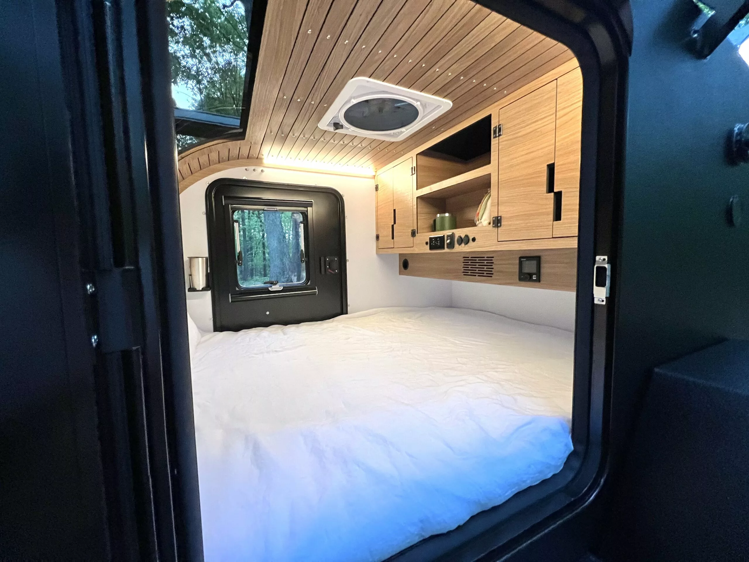 Cedar Ridge creates a rustic, woodsy interior with wood-style cabinets and paneling