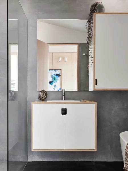 The home is complete with a sleek bathroom, featuring sustainably-sourced timber and bamboo toothbrushes
