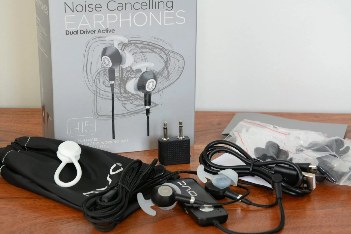 The OVC H15 ANC earphones come with three sized of tips, a USB charging cable and a fabric travel pouch