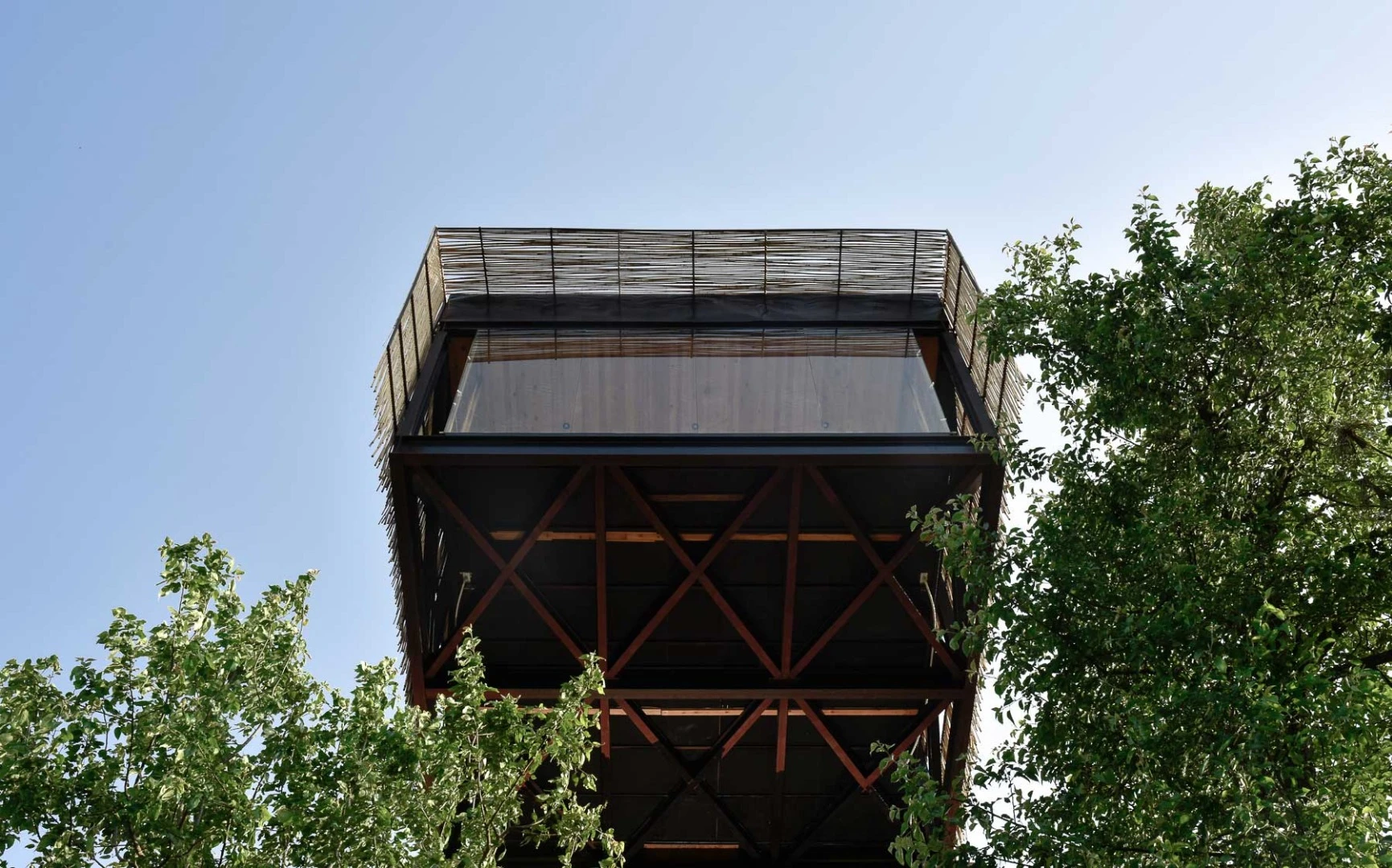 The Kumaon Hotel features a cantilevered dining room that juts out over the valley below