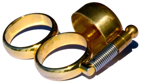 The Runbell's grip is made from brass-electroplated aluminum, while the bell itself is solid brass