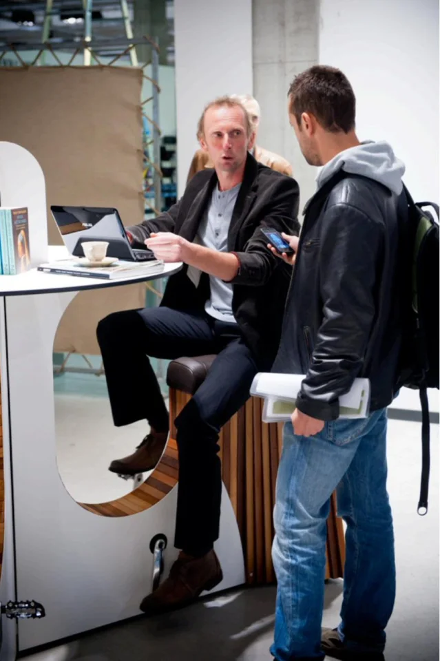 There's an interactive LED ring display in front of each seat which indicates the amount of human power being generated and the available AC power for charging devices