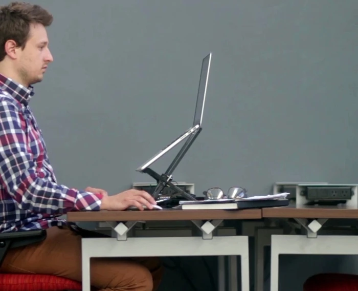 When fully extended, The Roost lifts the top of a 13-inch MacBook Air screen to 19.25 inches (48.9 cm) above the table