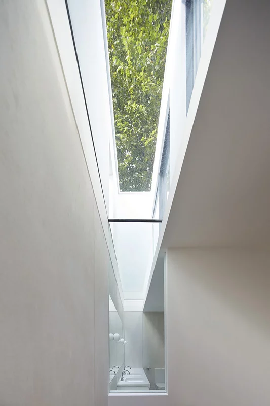 Light wells let in natural light without overlooking the neighbors (Photo: De Matos Ryan/© Hufton+Crow)