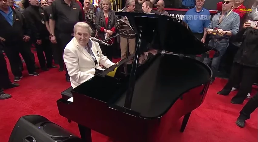 Jerry Lee Lewis singing "Great Balls of Fire" at the auction of his 1959 Harley-Davidson.